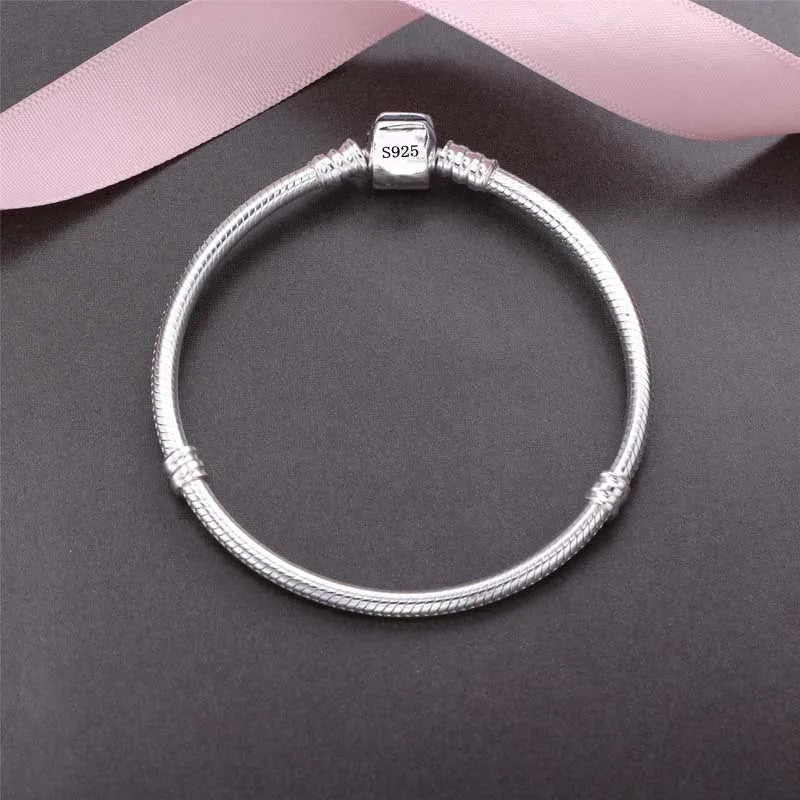 Handmade Silver Charm Bracelet – Smooth Snake Bone Design for Women