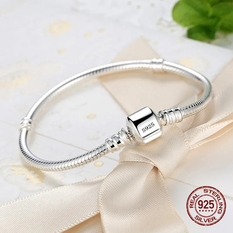 Handmade Silver Charm Bracelet – Smooth Snake Bone Design for Women
