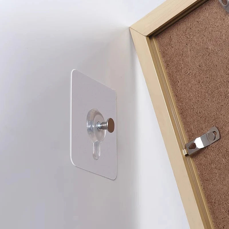 Adhesive Wall Hooks – Punch-Free Hanging for Frames, Clocks & More (50/1 Pcs)